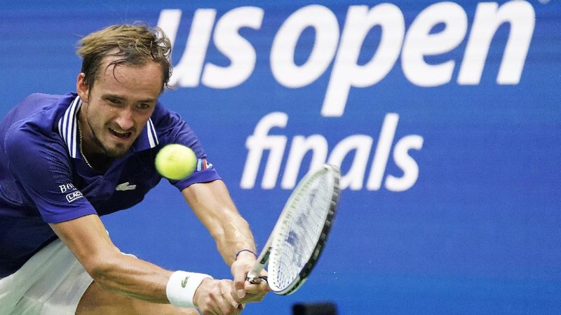 Daniil Medvedev, of Russia, kisses the championship trophy after defeating Novak Djokovic, of Serbia, during the men's singles final of the US Open tennis championships, Sunday, Sept. 12, 2021, in New York. (AP Photo/Seth Wenig)