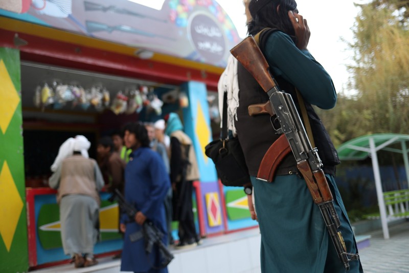 Taliban soldiers ride bumper cars in an amusement park in Kabul, Afghanistan, September 13, 2021. WANA (West Asia News Agency) via REUTERS ATTENTION EDITORS - THIS IMAGE HAS BEEN SUPPLIED BY A THIRD PARTY.