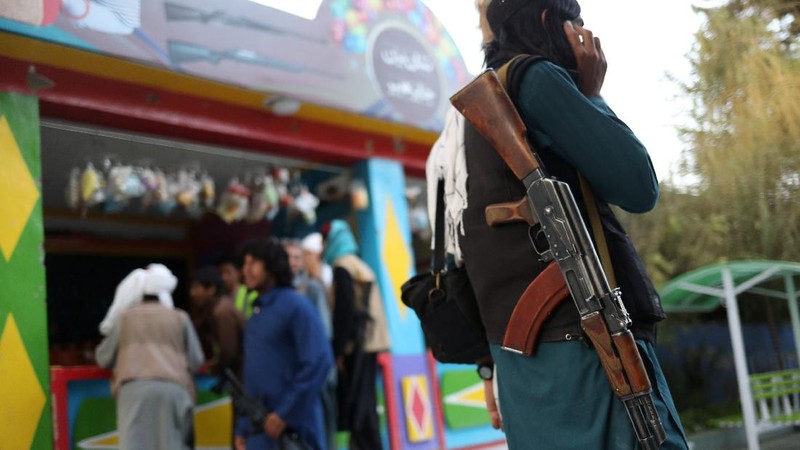 Taliban soldiers ride bumper cars in an amusement park in Kabul, Afghanistan, September 13, 2021. WANA (West Asia News Agency) via REUTERS ATTENTION EDITORS - THIS IMAGE HAS BEEN SUPPLIED BY A THIRD PARTY.