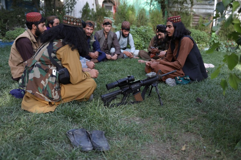 Taliban soldiers ride bumper cars in an amusement park in Kabul, Afghanistan, September 13, 2021. WANA (West Asia News Agency) via REUTERS ATTENTION EDITORS - THIS IMAGE HAS BEEN SUPPLIED BY A THIRD PARTY.