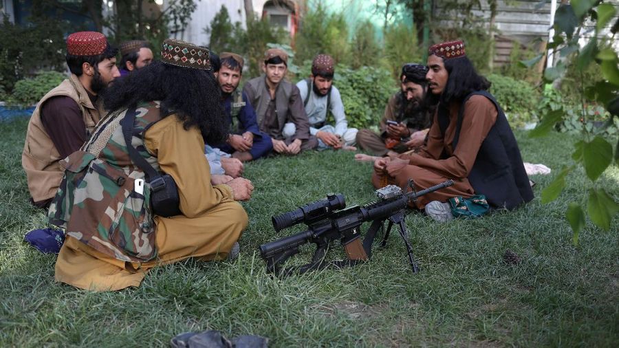 Taliban soldiers ride bumper cars in an amusement park in Kabul, Afghanistan, September 13, 2021. WANA (West Asia News Agency) via REUTERS ATTENTION EDITORS - THIS IMAGE HAS BEEN SUPPLIED BY A THIRD PARTY.