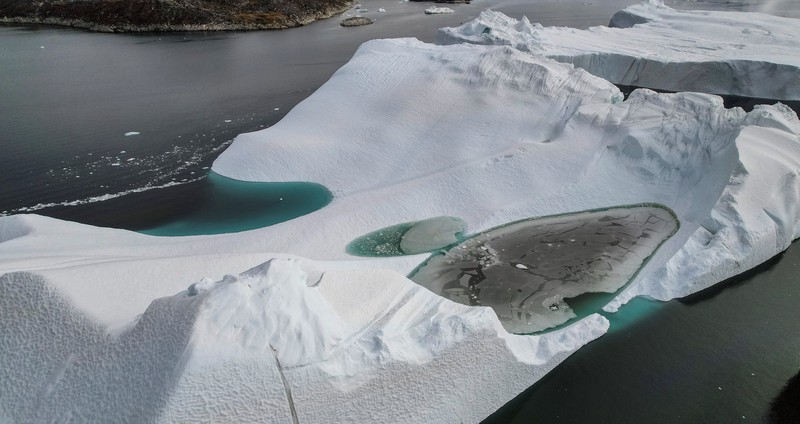 Icebergs are seen at the Disko Bay close to Ilulisat, Greenland, September 14, 2021. REUTERS/Hannibal Hanschke