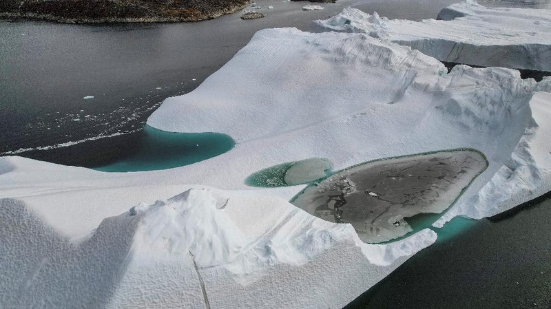 Icebergs are seen at the Disko Bay close to Ilulisat, Greenland, September 14, 2021. REUTERS/Hannibal Hanschke