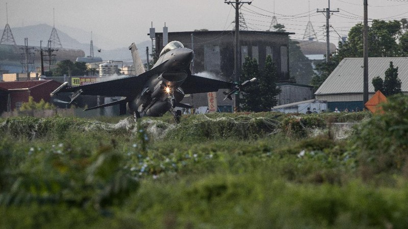 In this photo released by the Taiwan Presidential Office, a military jet taxis along a highway in Jiadong, Taiwan, Wednesday, Sept. 15, 2021. Four military aircraft landed on the highway and took off again on Wednesday as part of Taiwan's five-day Han Guang military exercise designed to prepare the island's forces for an attack by China, which claims Taiwan as part of its own territory. (Taiwan Presidential Office via AP)