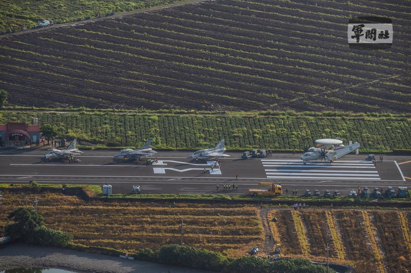 In this photo released by the Taiwan Presidential Office, a military jet taxis along a highway in Jiadong, Taiwan, Wednesday, Sept. 15, 2021. Four military aircraft landed on the highway and took off again on Wednesday as part of Taiwan's five-day Han Guang military exercise designed to prepare the island's forces for an attack by China, which claims Taiwan as part of its own territory. (Taiwan Presidential Office via AP)