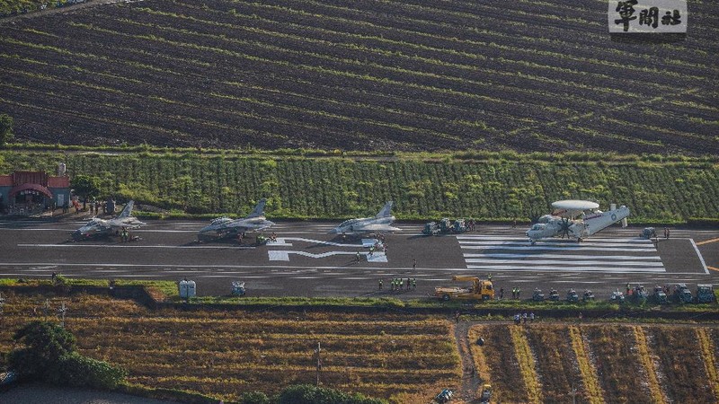 In this photo released by the Taiwan Presidential Office, a military jet taxis along a highway in Jiadong, Taiwan, Wednesday, Sept. 15, 2021. Four military aircraft landed on the highway and took off again on Wednesday as part of Taiwan's five-day Han Guang military exercise designed to prepare the island's forces for an attack by China, which claims Taiwan as part of its own territory. (Taiwan Presidential Office via AP)