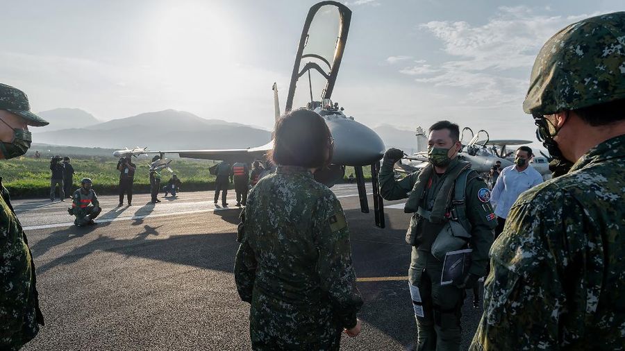 In this photo released by the Taiwan Presidential Office, a military jet taxis along a highway in Jiadong, Taiwan, Wednesday, Sept. 15, 2021. Four military aircraft landed on the highway and took off again on Wednesday as part of Taiwan's five-day Han Guang military exercise designed to prepare the island's forces for an attack by China, which claims Taiwan as part of its own territory. (Taiwan Presidential Office via AP)