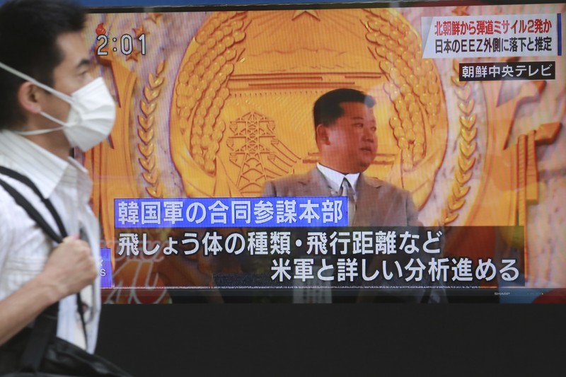 In this image taken from video provided by the South Korea Defense Ministry, South Korea's first underwater-launched ballistic missile is test-fired from a 3,000-ton-class submarine at an undisclosed location in the waters of South Korea, Wednesday, Sept. 15, 2021. The rival Koreas test-launched ballistic missiles hours apart from each other on Wednesday in a display of military assets that came amid a faltering diplomatic push to strip North Korea of its nuclear program. South Korea's presidential office said it conducted its first underwater-launched ballistic missile test on Wednesday afternoon. It said a domestically built missile fired from a 3,000-ton-class submarine flew a previously set distance before hitting a designated target. (South Korea Defense Ministry via AP)