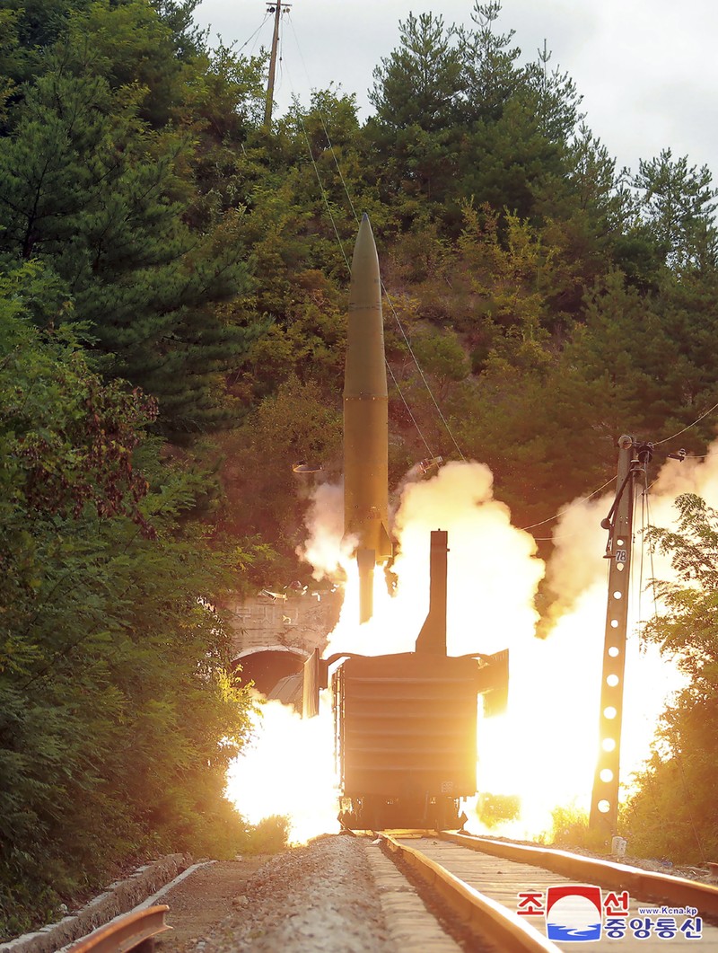 This photo provided by the North Korean government Thursday, Sept. 16, 2021, shows a test missile launched from a train on Sept. 15, 2021, in an undisclosed location of North Korea. North Korea says it succeeded in launching ballistic missiles from a train for the first time in part of continuing efforts to bolster its “war deterrence,” a day after the two Koreas tested-fired missiles hours apart. Independent journalists were not given access to cover the event depicted in this image distributed by the North Korean government. The content of this image is as provided and cannot be independently verified. Korean language watermark on image as provided by source reads: 