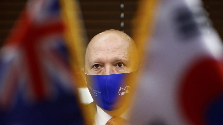 Australian Defense Minister Peter Dutton attends a meeting with his South Korean counterpart Suh Wook at the Ministry of National Defense in Seoul, South Korea, Monday, Sept. 13, 2021. Dutton and Foreign Minister Marise Payne are visiting Seoul to attend an Australia and South Korea 2+2 meeting in Seoul to discuss security cooperation between the two countries. (Jeon Heon-Kyun/Pool Photo via AP)