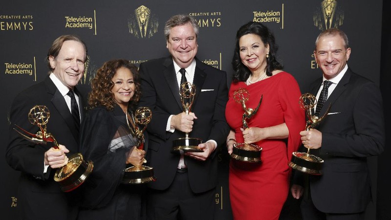 Showrunner Peter Morgan, Director Jessica Hobbs, Executive Producers Stephen Daldry, Robert Fox, Matthew Byam Shaw and Suzanne Mackie, and Producer Oona O'Beirn, pose at the Netflix UK Primetime Emmy Red Carpet for 