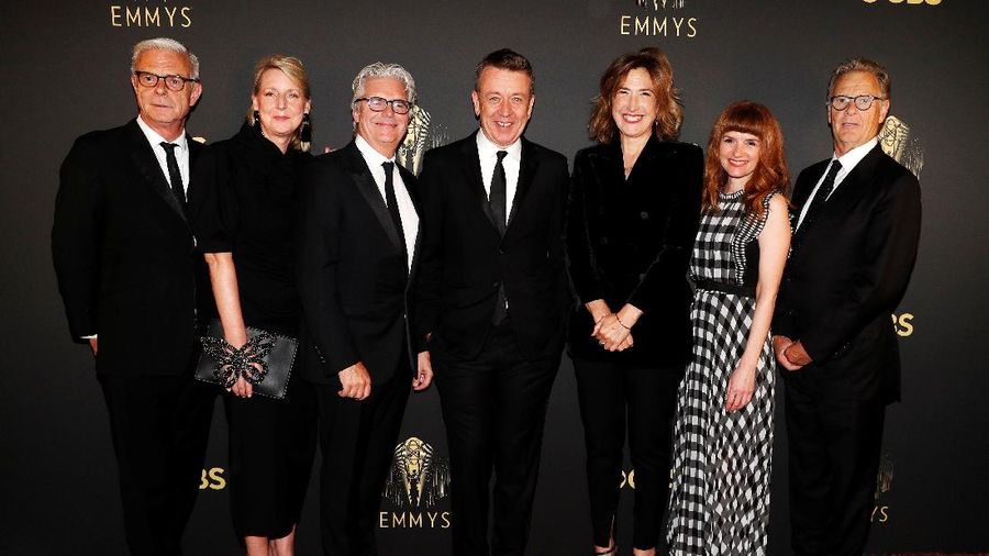 Showrunner Peter Morgan, Director Jessica Hobbs, Executive Producers Stephen Daldry, Robert Fox, Matthew Byam Shaw and Suzanne Mackie, and Producer Oona O'Beirn, pose at the Netflix UK Primetime Emmy Red Carpet for 