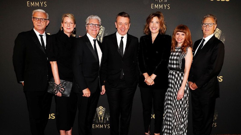 Showrunner Peter Morgan, Director Jessica Hobbs, Executive Producers Stephen Daldry, Robert Fox, Matthew Byam Shaw and Suzanne Mackie, and Producer Oona O'Beirn, pose at the Netflix UK Primetime Emmy Red Carpet for 