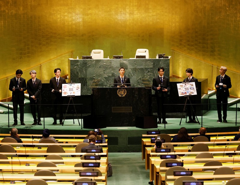 Members of the South Korean band BTS walk near the United Nations headquarters during the 76th Session of the United Nations General Assembly in Manhattan, New York, U.S., September 20, 2021. REUTERS/Eduardo Munoz