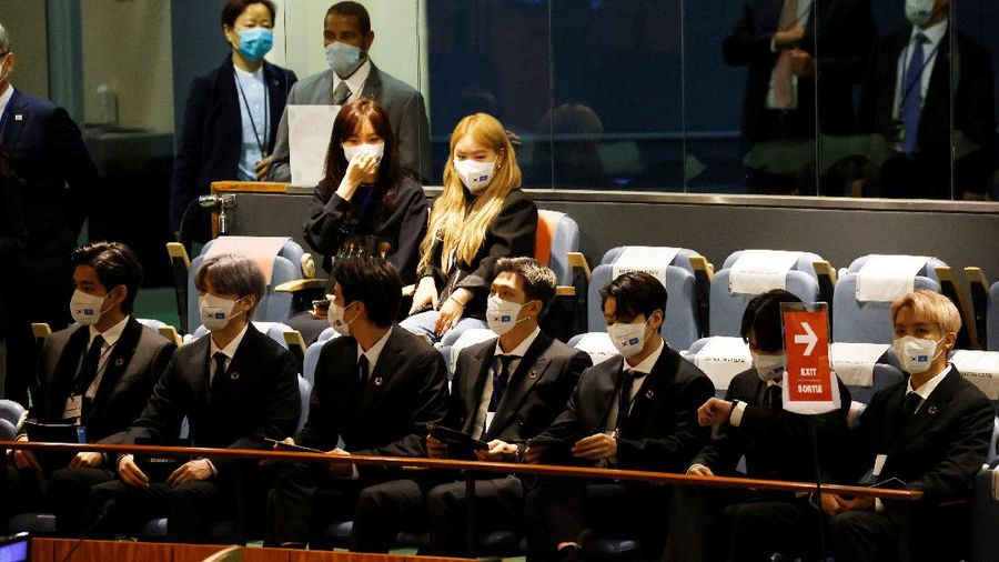Members of the South Korean band BTS walk near the United Nations headquarters during the 76th Session of the United Nations General Assembly in Manhattan, New York, U.S., September 20, 2021. REUTERS/Eduardo Munoz