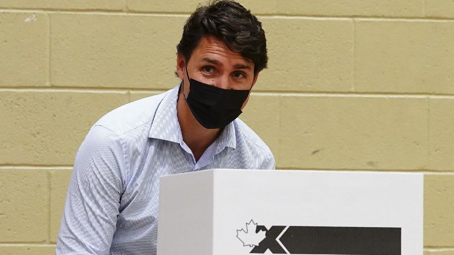 Liberal leader Justin Trudeau votes in  Montreal, Quebec on Monday, Sept. 20, 2021.  Canadians are voting in a pandemic election that threatens to knock Prime Minister Justin Trudeau from power. Trudeau gambled on an early election Monday in a bid to win a majority of seats in Parliament. (Sean Kilpatrick/The Canadian Press via AP)