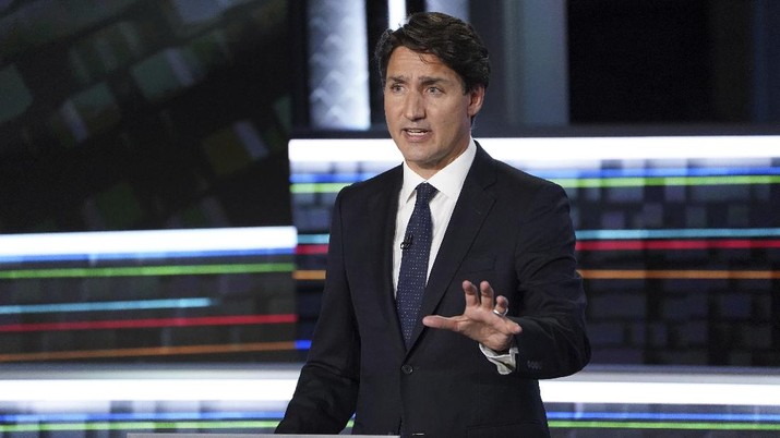 PM Kanada, Justin Trudeau FILE - Liberal leader Justin Trudeau makes a point during the federal election French-language leaders debate, Wednesday, Sept. 8, 2021, in Gatineau, Quebec. Trudeau called the early election for Monday, Sept. 20 in hopes of winning a majority of seats in Parliament, but has faced criticism for calling a vote during a pandemic in order to cement his hold on power. (Sean Kilpatrick/The Canadian Press via AP)