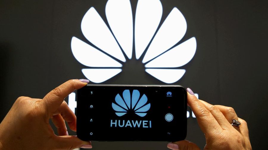 FILE PHOTO: A Huawei logo is seen on a cell phone screen in their store at Vina del Mar, Chile July 18, 2019. REUTERS/Rodrigo Garrido/File Photo