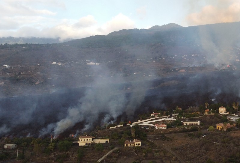 Screen grab from a video taken by a night drone shows a volcano erupting and tongues of lava in La Palma, Spain September 22, 2021. Spanish Emergency Military Unit (UME)/Reuters TV/Handout via REUTERS  THIS IMAGE HAS BEEN SUPPLIED BY A THIRD PARTY.