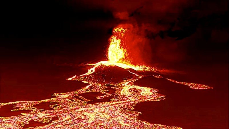 Screen grab from a video taken by a night drone shows a volcano erupting and tongues of lava in La Palma, Spain September 22, 2021. Spanish Emergency Military Unit (UME)/Reuters TV/Handout via REUTERS  THIS IMAGE HAS BEEN SUPPLIED BY A THIRD PARTY.