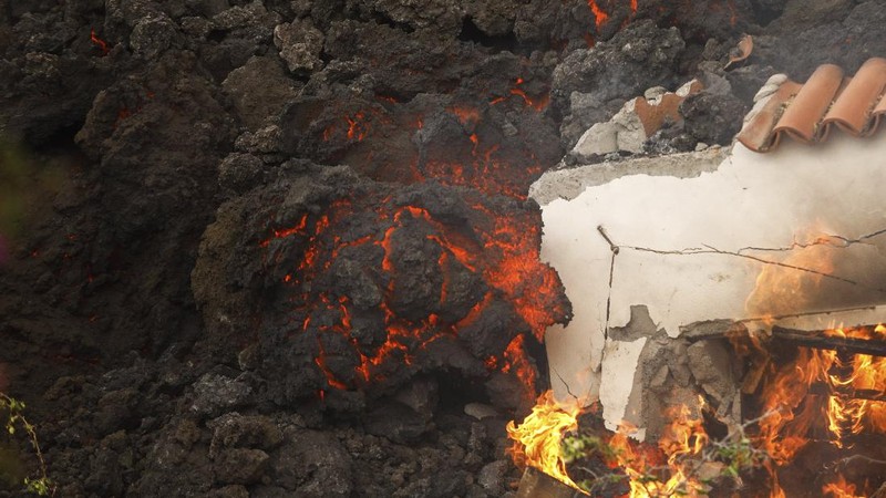 Screen grab from a video taken by a night drone shows a volcano erupting and tongues of lava in La Palma, Spain September 22, 2021. Spanish Emergency Military Unit (UME)/Reuters TV/Handout via REUTERS  THIS IMAGE HAS BEEN SUPPLIED BY A THIRD PARTY.