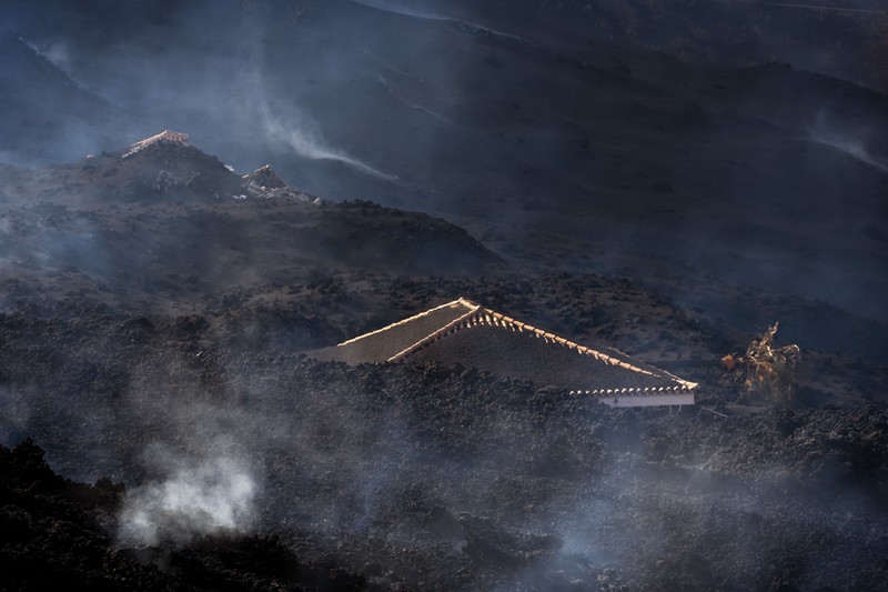 Screen grab from a video taken by a night drone shows a volcano erupting and tongues of lava in La Palma, Spain September 22, 2021. Spanish Emergency Military Unit (UME)/Reuters TV/Handout via REUTERS  THIS IMAGE HAS BEEN SUPPLIED BY A THIRD PARTY.