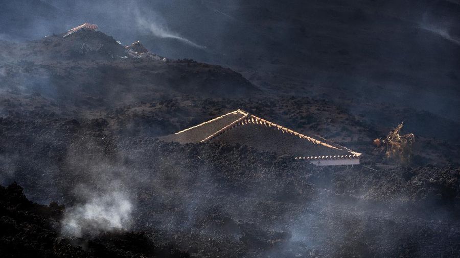 Screen grab from a video taken by a night drone shows a volcano erupting and tongues of lava in La Palma, Spain September 22, 2021. Spanish Emergency Military Unit (UME)/Reuters TV/Handout via REUTERS  THIS IMAGE HAS BEEN SUPPLIED BY A THIRD PARTY.