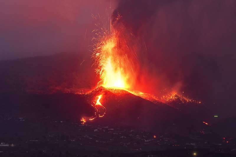 Screen grab from a video taken by a night drone shows a volcano erupting and tongues of lava in La Palma, Spain September 22, 2021. Spanish Emergency Military Unit (UME)/Reuters TV/Handout via REUTERS  THIS IMAGE HAS BEEN SUPPLIED BY A THIRD PARTY.