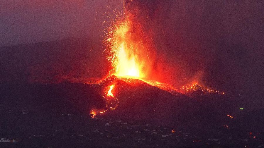 Screen grab from a video taken by a night drone shows a volcano erupting and tongues of lava in La Palma, Spain September 22, 2021. Spanish Emergency Military Unit (UME)/Reuters TV/Handout via REUTERS  THIS IMAGE HAS BEEN SUPPLIED BY A THIRD PARTY.