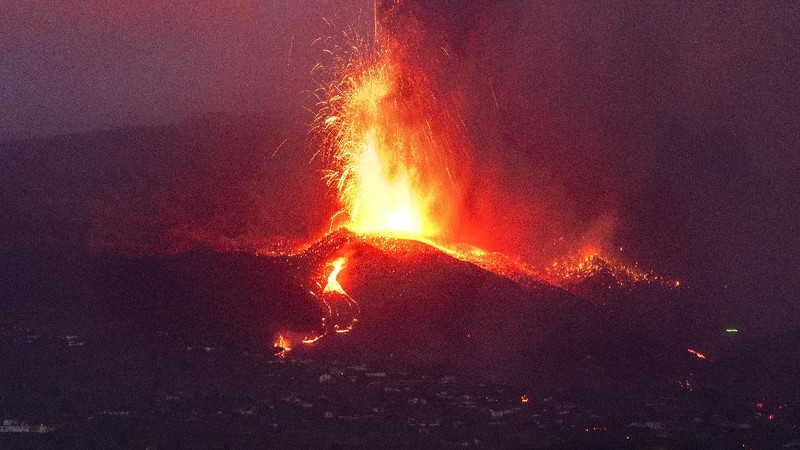 Screen grab from a video taken by a night drone shows a volcano erupting and tongues of lava in La Palma, Spain September 22, 2021. Spanish Emergency Military Unit (UME)/Reuters TV/Handout via REUTERS  THIS IMAGE HAS BEEN SUPPLIED BY A THIRD PARTY.