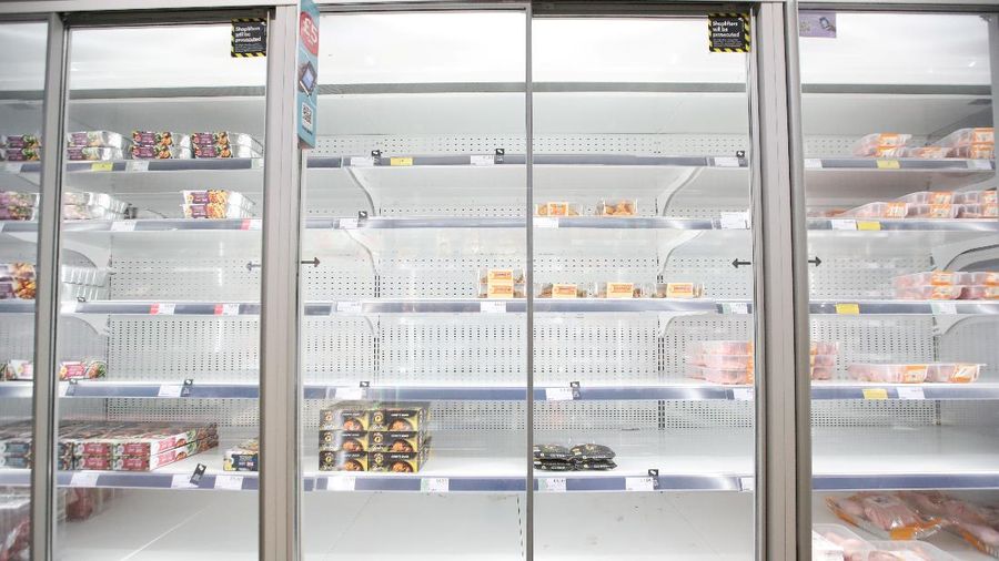 Empty shelves are seen in the meat aisle of Co-Op supermarket, Harpenden, Britain, September 22, 2021.  REUTERS/Peter Cziborra