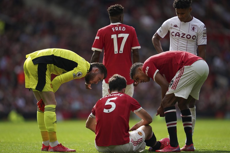 Pemain Manchester United Cristiano Ronaldo, (tengah) beraksi selama pertandingan sepak bola Liga Premier Inggris antara Manchester United dan Aston Villa di stadion Old Trafford di Manchester, Inggris, Sabtu, 25 September 2021. (AP Photo/Jon Super) Manchester United's Cristiano Ronaldo, center, in action during the English Premier League soccer match between Manchester United and Aston Villa at the Old Trafford stadium in Manchester, England, Saturday, Sept 25, 2021. (AP Photo/Jon Super)