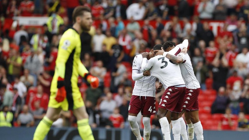 Manchester United's Cristiano Ronaldo, center, in action during the English Premier League soccer match between Manchester United and Aston Villa at the Old Trafford stadium in Manchester, England, Saturday, Sept 25, 2021. (AP Photo/Jon Super)