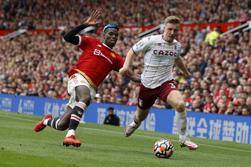 Manchester United's Cristiano Ronaldo, center, in action during the English Premier League soccer match between Manchester United and Aston Villa at the Old Trafford stadium in Manchester, England, Saturday, Sept 25, 2021. (AP Photo/Jon Super)
