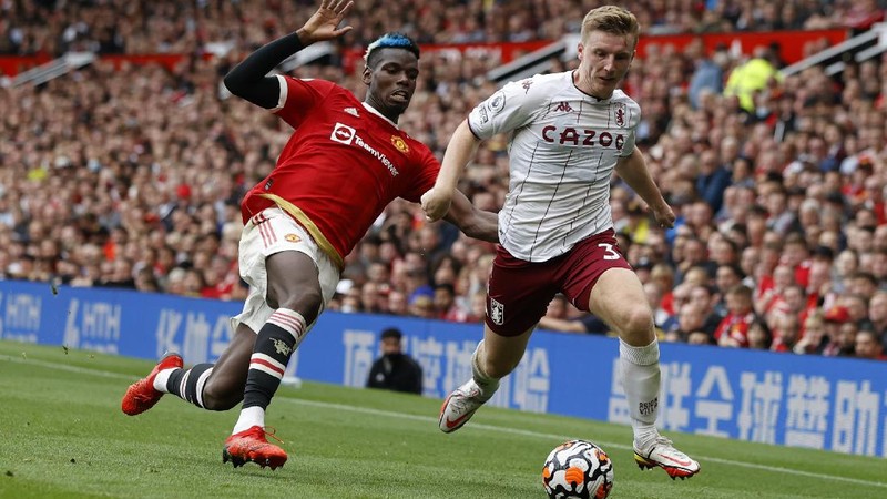 Manchester United's Cristiano Ronaldo, center, in action during the English Premier League soccer match between Manchester United and Aston Villa at the Old Trafford stadium in Manchester, England, Saturday, Sept 25, 2021. (AP Photo/Jon Super)