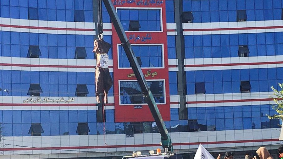 SENSITIVE MATERIAL. THIS IMAGE MAY OFFEND OR DISTURB    A dead body of a man hung by the Taliban from a crane is seen in the main square of Herat city in Afghanistan September 25, 2021.REUTERS/Stringer  NO RESALES. NO ARCHIVE