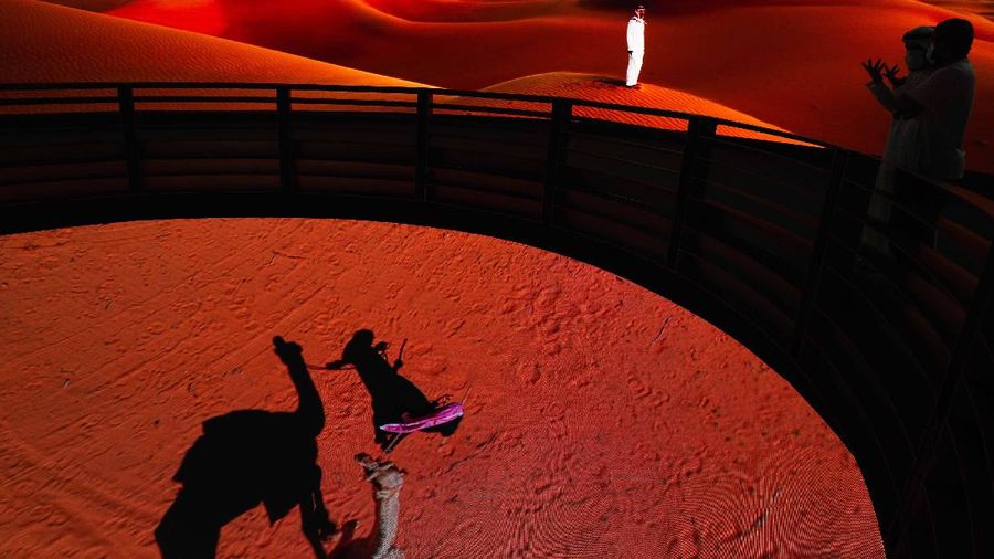 People visit the Russia pavilion during the first day of the Dubai Expo 2020 in Dubai, United Arab Emirates, Friday, Oct, 1, 2021. (AP Photo/Kamran Jebreili)
