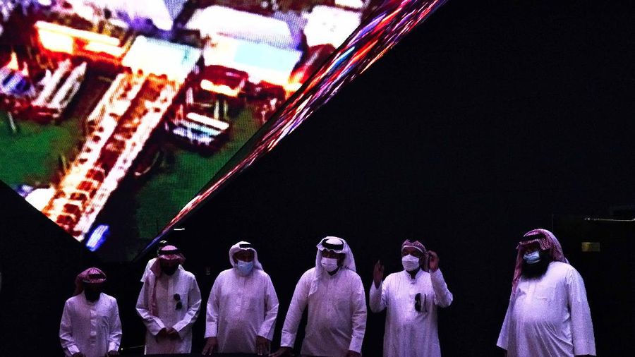 People visit the Russia pavilion during the first day of the Dubai Expo 2020 in Dubai, United Arab Emirates, Friday, Oct, 1, 2021. (AP Photo/Kamran Jebreili)