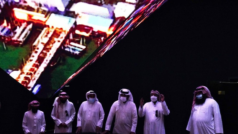 People visit the Russia pavilion during the first day of the Dubai Expo 2020 in Dubai, United Arab Emirates, Friday, Oct, 1, 2021. (AP Photo/Kamran Jebreili)