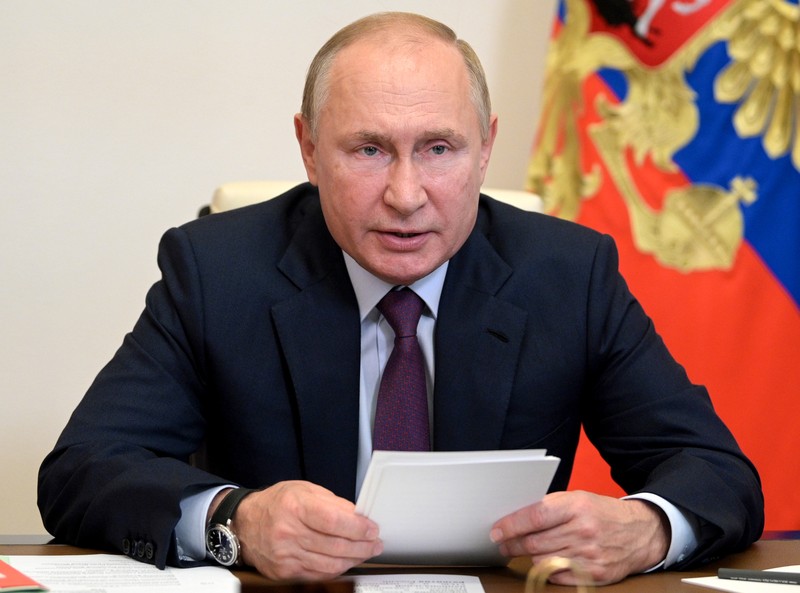 Pandora Papers FILE - Russian President Vladimir Putin chairs a Security Council meeting via video conference at the Novo-Ogaryovo residence outside Moscow, Russia, in this Monday, Sept. 27, 2021, file photo. Hundreds of world leaders, powerful politicians, billionaires, celebrities, religious leaders and drug dealers have been stashing away their investments in mansions, exclusive beachfront property, yachts and other assets for the past quarter century, according to a review of nearly 12 million files obtained from 14 different firms located around the world. The report released Sunday, Oct. 3, 2021 by the International Consortium of Investigative Journalists involved 600 journalists from 150 media outlets in 117 countries. Russian President Vladimir Putin is one of 330 current and former politicians identified as beneficiaries of the secret accounts. (Alexei Druzhinin, Sputnik, Kremlin Pool Photo via AP, File)