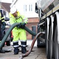 A member of the military takes part in refuelling at a BP fuel station in Waltham Abbey, Britain, October 5, 2021. REUTERS/Henry Nicholls