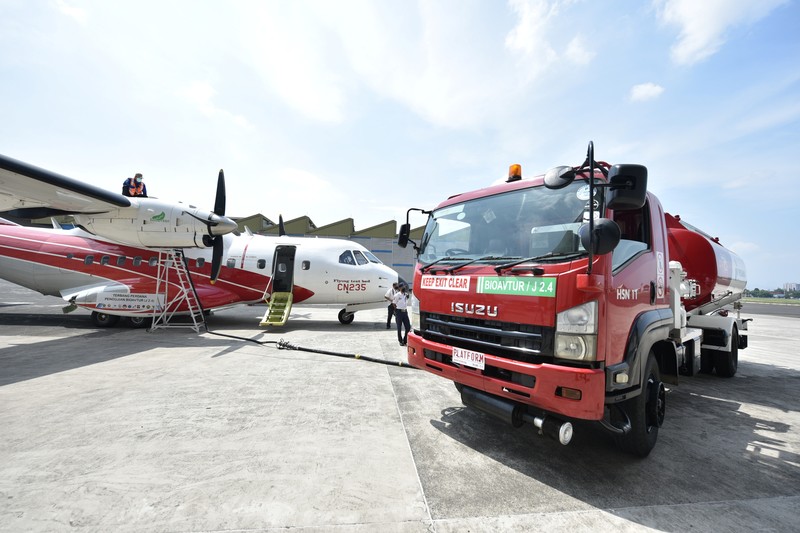 ITALY-CRASH/PLANE Fire fighters work at the scene where a small plane crashed into a building in San Donato Milanese, Italy, October 3, 2021. REUTERS/Flavio Lo Scalzo