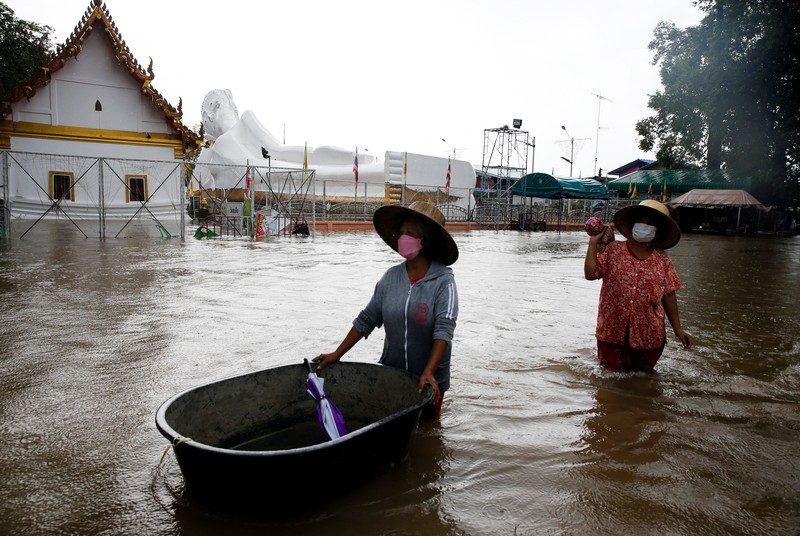A lying Buddha statue is seen during the flood at a Temple in Ayutthaya, Thailand, October 6, 2021. REUTERS/Soe Zeya Tun