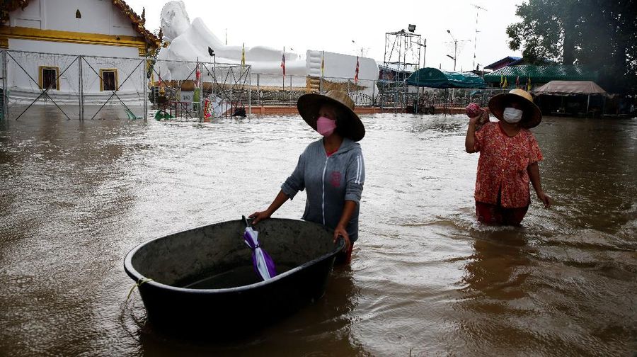 A lying Buddha statue is seen during the flood at a Temple in Ayutthaya, Thailand, October 6, 2021. REUTERS/Soe Zeya Tun