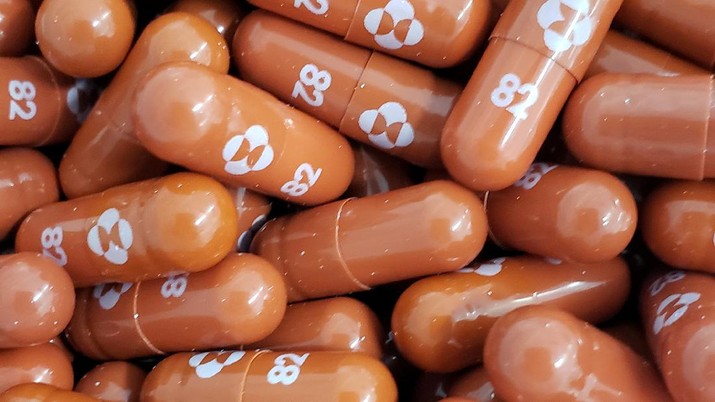 MODERNA-STOCKS/ FILE PHOTO: An experimental COVID-19 treatment pill called molnupiravir being developed by Merck & Co Inc and Ridgeback Biotherapeutics LP, is seen in this undated handout photo released by Merck & Co Inc and obtained by Reuters May 17, 2021. Merck & Co Inc/Handout via REUTERS ATTENTION EDITORS - THIS IMAGE HAS BEEN SUPPLIED BY A THIRD PARTY. MANDATORY CREDIT. THIS IMAGE WAS PROCESSED BY REUTERS TO ENHANCE QUALITY, AN UNPROCESSED VERSION HAS BEEN PROVIDED SEPARATELY/File Photo