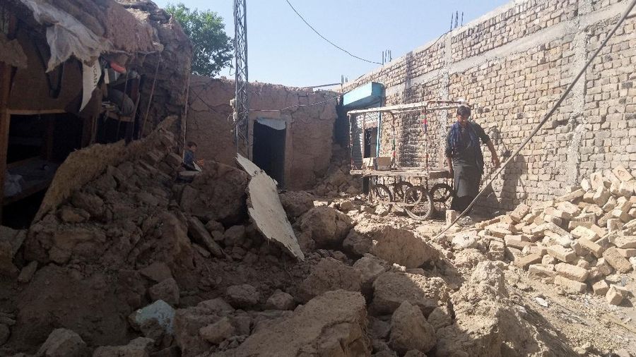 People gather outside a hospital following an earthquake in Harnai, Balochistan, Pakistan, October 7, 2021, in this still image obtained from video. Courtesy of QuettaVoice.com / Social Media via REUTERS  ATTENTION EDITORS - THIS IMAGE HAS BEEN SUPPLIED BY A THIRD PARTY. NO RESALES. NO ARCHIVE. MANDATORY CREDIT QUETTAVOICE.COM.