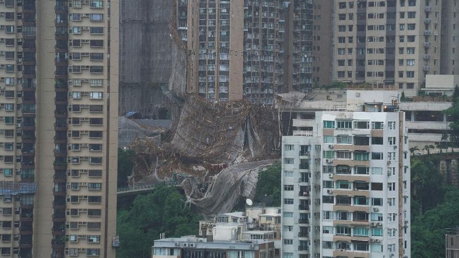 Collapsed bamboo scaffolds of a residential building are seen as Typhoon Lionrock hits Hong Kong, China October 8, 2021. REUTERS/Lam Yik