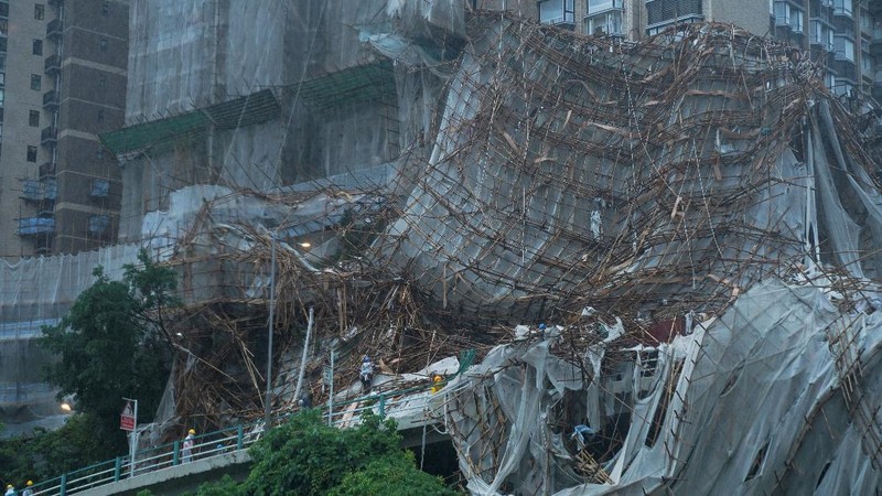 Collapsed bamboo scaffolds of a residential building are seen as Typhoon Lionrock hits Hong Kong, China October 8, 2021. REUTERS/Lam Yik