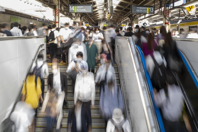 Japan Earthquake Passengers wait in a long line to get into JR Kawaguchi station in Kawaguchi, near Tokyo Friday, Oct. 8, 2021. Entry to the station was restricted due to aftermath of Thursday's strong earthquake. (Kyodo News via AP)