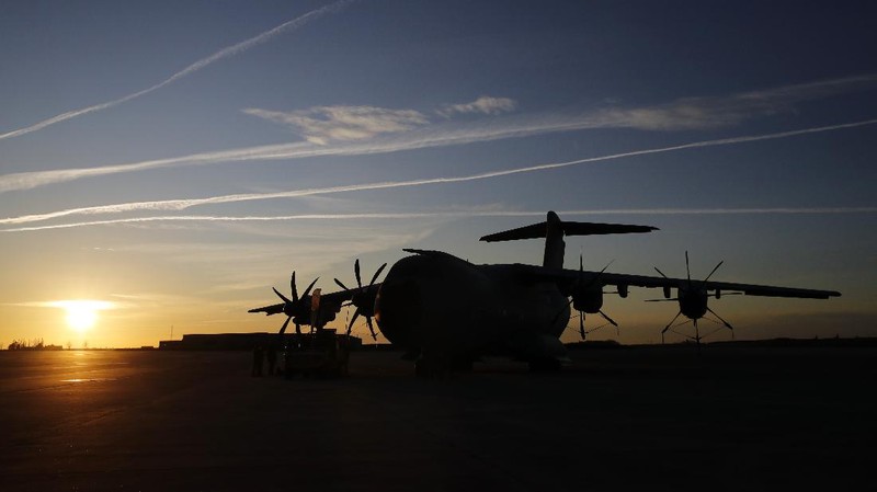 An Indonesian Air Force soldier guards in front of British air force RAF A400M transport aircraft during a visit at Halim Perdanakusuma airport in Jakarta, Indonesia, Tuesday, Nov. 12, 2019.(AP Photo/Achmad Ibrahim)
